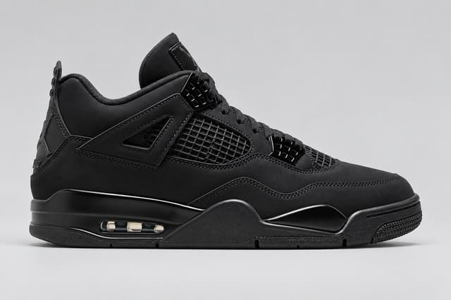 Black Air Jordan 4 Retro sneaker in side profile